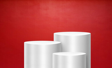 White shelves in a studio room for displaying products, red background.