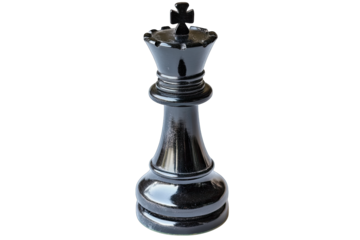 black chess king piece showcasing its distinctive crown and base design symbolizing power and strategy in the game of chess