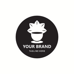white coffee cup and leaf logo with black circle background