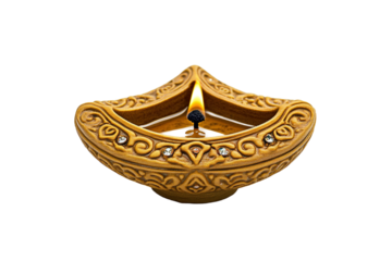 Decorative oil lamp with intricate carvings and small jewels, radiating a warm glow against a transparent background