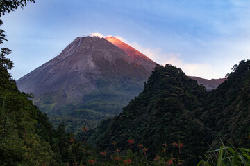View of Mount Merapi on the southwest side as well as Turgo Hill and Plawangan Hill on a sunny...