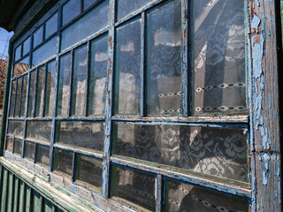A window with a lot of broken glass on it