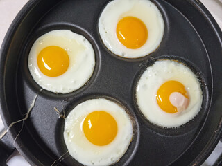 It's a fried egg made half-boiled.