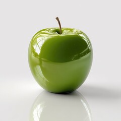 Polished green apple on a reflective surface.