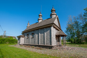 Fototapeta premium Wooden Greek Catholic Church of the Protection of the Most Holy Mother of God in Godkowo, Warmian-Masurian Voivodeship, Poland 