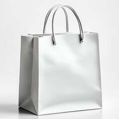 Isolated white shopping bag with handles on plain white background, PNG format, minimal retail object ideal for branding, packaging, or product mockups

