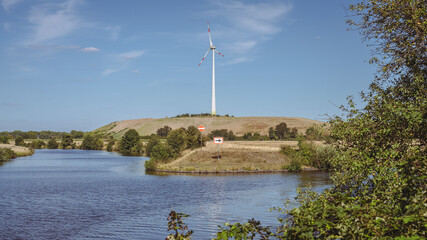 A wind turbine on the Grosse Ruhrinsel, Muelheim an der Ruhr, Ruhr Area, North-Rhine Westphalia, Germany