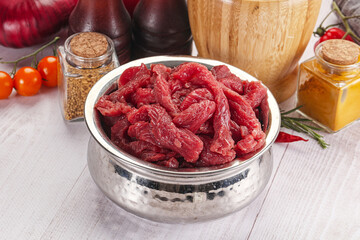 Raw beef meat - sliced strips