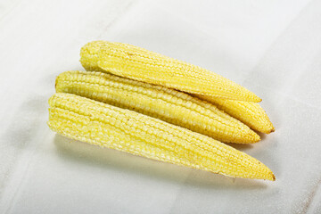 Raw sweet baby corn heap
