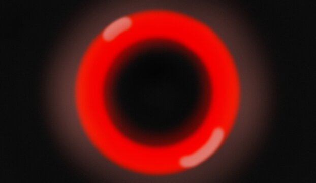Red circular abstract design shines with a rough dark background, for the correct and cover of the Walpeper poster