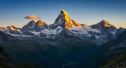 Majestic Mountain Peaks Illuminated at Golden Hour