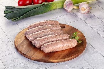 Raw pork sausages for grill