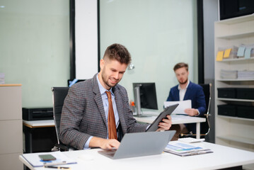 Confident businessman works on analytics, tax reports and financial research. Success, accounting and strategy