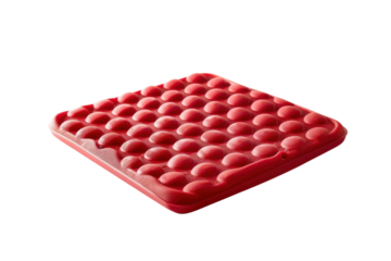 Bright red sensory toy with bubbles for tactile play on a white background isolated on transparent background