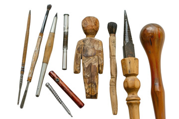 Artisan tools arranged artfully with a wooden carving of a figure on a neutral background isolated on transparent background