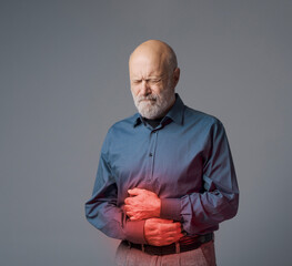 Senior man with gastrointestinal disease and stomach pain