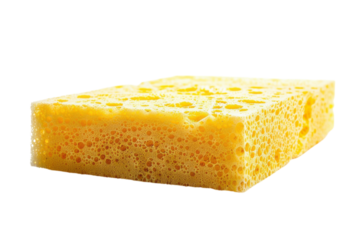 Bright yellow kitchen sponge resting on a clean surface, ready for everyday cleaning tasks isolated on transparent background