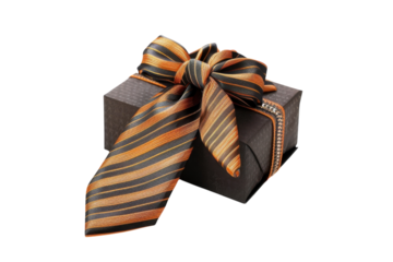 A beautifully wrapped gift box adorned with a stylish tie in bold orange and black colors isolated on transparent background