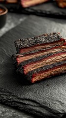 Succulent Beef Brisket Slices on Dark Slate Plate Close Up Gourmet Culinary Delicacy Barbecue Smokehouse Cuisine Delicious Food Photography
