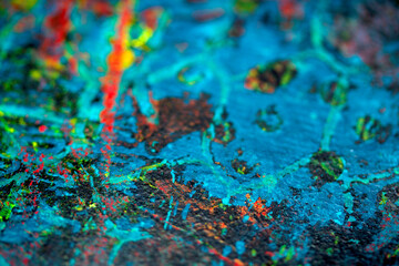 Thick abstract paint surface with heavy texture looking a bit like graffiti hand drawn real dark...
