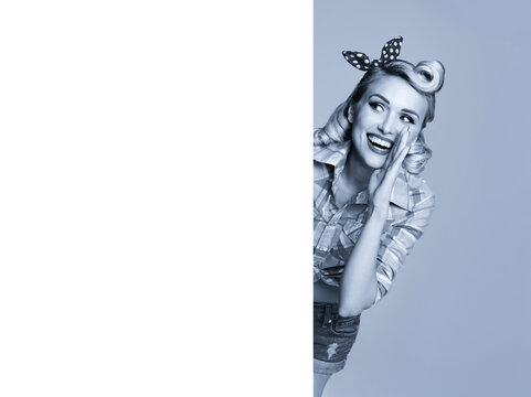 Beautiful smile pinup woman show point blank poster, banner with free text space. Pin up cute girl advertise, isolate background. Blond hair model in retro vintage ad concept. Black and white image