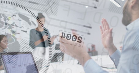 Image of financial data processing and globe over diverse business people in office