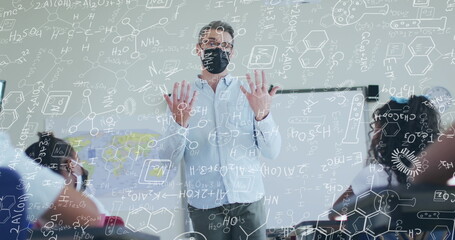 Image of chemical equations over diverse schoolchildren and teacher wearing face masks