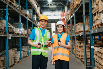 Male and Female Supervisors Use Tablet Discuss Product Delivery while Folding Package. Retail...