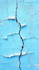 Fototapeta premium Cracked Blue Wall Texture: A Study in Decay and Time