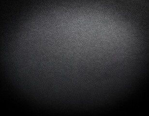 Obraz premium Grainy texture background fading from black to light gray with vignette 
