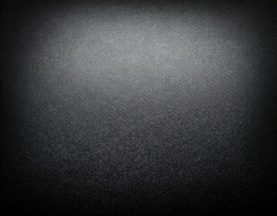 Obraz premium Grainy texture background fading from black to light gray with vignette 