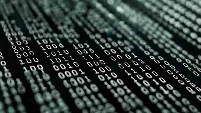 Streams of binary code flow across a dark background, creating a mesmerizing digital effect that evokes a sense of technology and data processing.