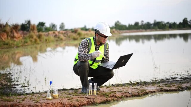 An environmentalist is collecting samples of water to be tested for contaminants in a science lab.
