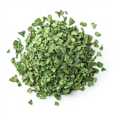 Obraz premium Close up of a pile of dried green herbs isoleted on white background