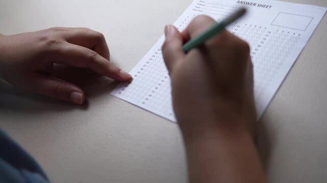 Student practices exam questions for testing coming soon at library