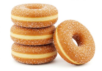 A stack of three donuts and one donut leaning against the stack on a white background isolated close up