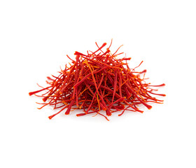 Fototapeta premium Closeup of Saffron threads showcasing their delicate texture and rich red hue isolated on white background.