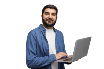 Individual Engaged in Digital Work While Standing in a Bright, Neutral Environment With a Laptop in Hand