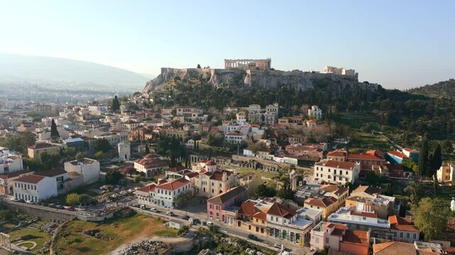 Aerial view of the Acropolis and historic center of Athens, Greece, with ancient ruins, traditional buildings, and scenic urban cityscape