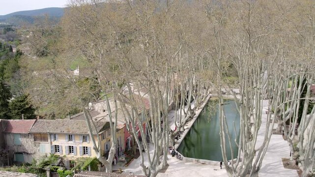 Aerial flyover view above the village of Curcuron France