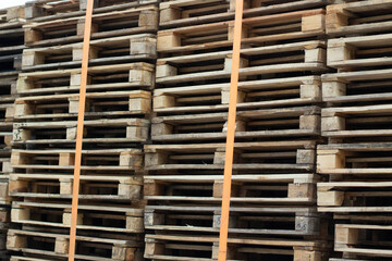 Wooden pallets. Pallet warehouse. Lots of boards.