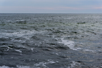 waves breaking on the beach