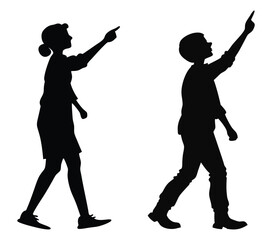 Silhouette of a woman and a boy pointing upward while walking