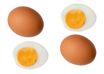 Top view set of two raw brown chicken eggs and two boiled or cooked eggs in two halves with egg yolk isolated on white background with clipping path