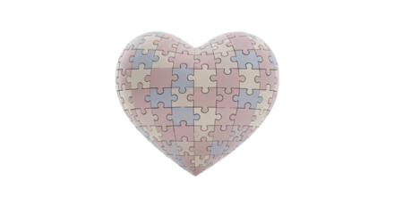 Heart shape composed of colorful puzzle pieces, appearing to float with a soft drop shadow effect. Isolated on a white background. Autism awareness concept.