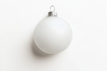 Minimalist white ornament with sleek surface reflecting soft lig