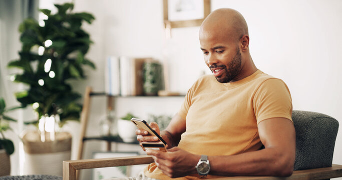 Home, black man and phone with credit card for ecommerce, password information and payment. Sofa, male person and mobile with debit for online shopping, transaction and subscription for application