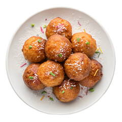 Dish with oliebollen on white plate top view isolated on white background