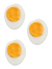 Top view set of unpeeled cooked or boiled chicken eggs in three halves with egg yolks isolated with clipping path in png file format