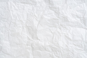 Top view and full frame of wrinkled or crumpled white paper texture used as crumpled white paper background texture in decorative art work